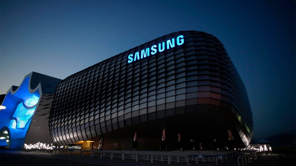 Samsung Electronics: The Technology Giant Shaping the Future Samsung Electronics building exterior at night with illuminated Samsung logo on modern curved facade.